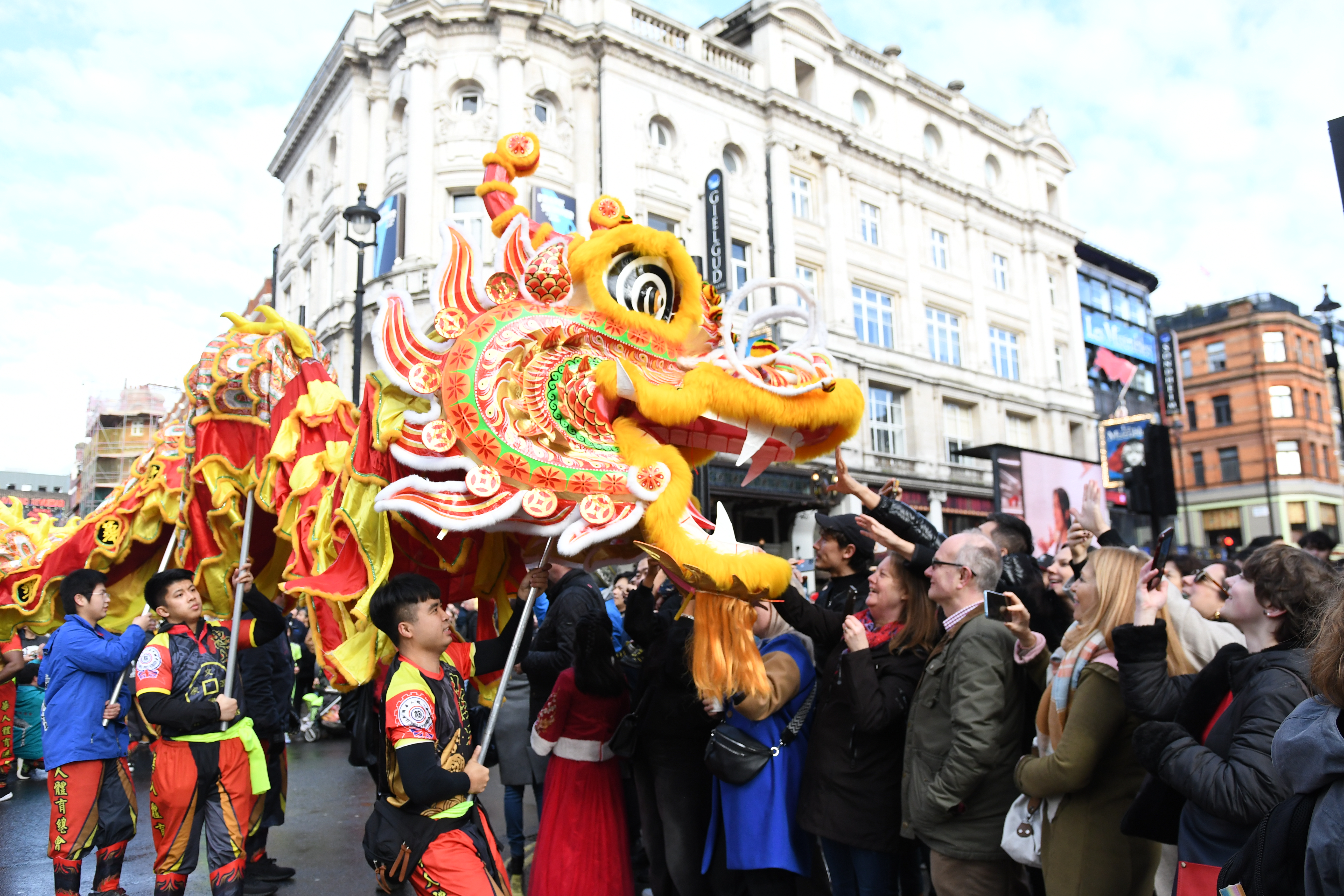 Dragon Dance in Parade by Allan Hong